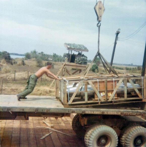 Loading Napalm On Trucks